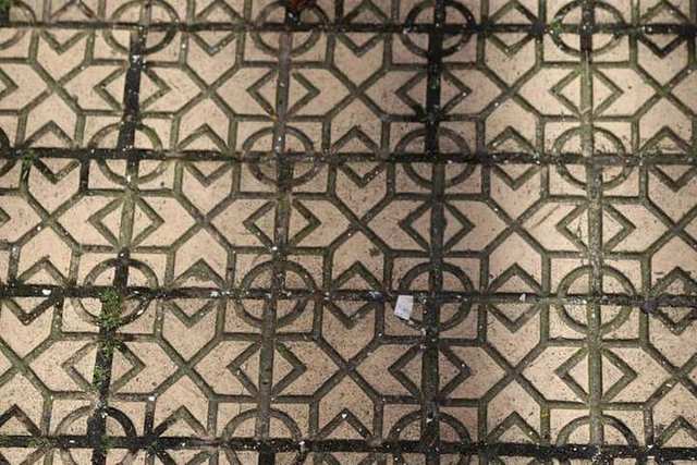 Patterned floor tiles in a tiled interior