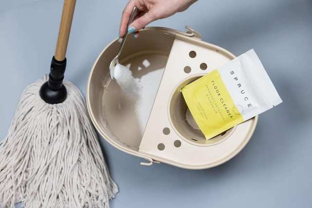 Mop bucket and cleaning supplies
