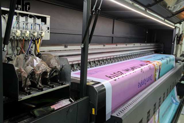 Wide-format printer producing a colourful banner