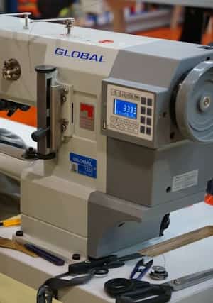 Industrial sewing machine and fabric in a workshop