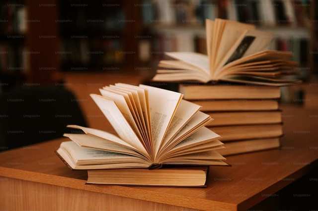 Open books on a desk