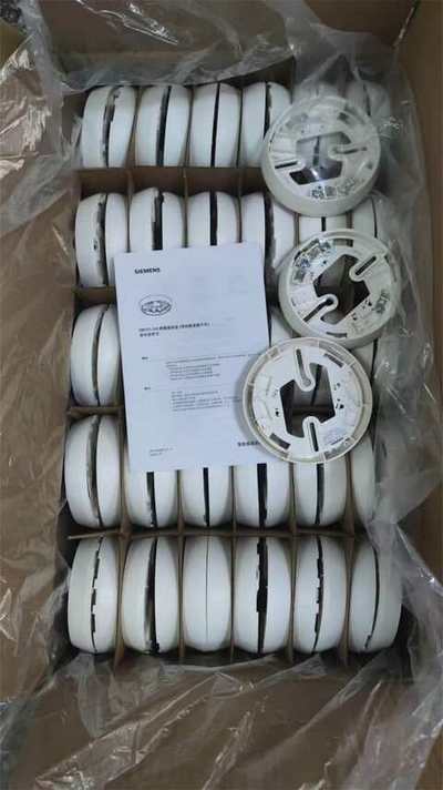 Smoke detectors mounted on a ceiling