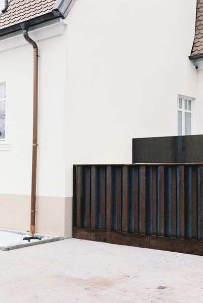 House exterior with a visible rainwater downspout