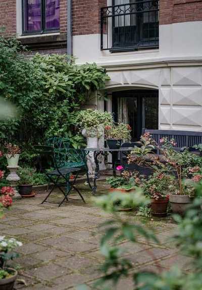 Garden patio with planted borders