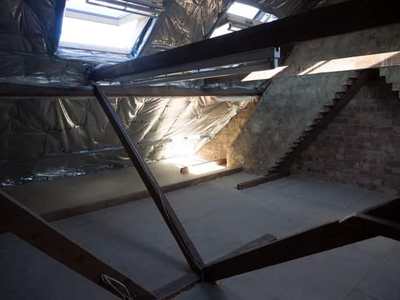 Attic room with exposed timber beams
