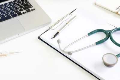 Veterinary stethoscope and examination tools on a table